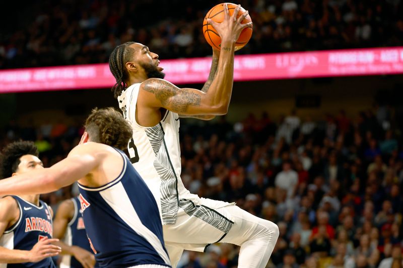 Jan 17, 2026; Orlando, Florida, USA;  Central Florida Knights forward Jordan Burks (99) takes a shot in the first half against the Arizona Wildcats at Addition Financial Arena. Mandatory Credit: Russell Lansford-Imagn Images