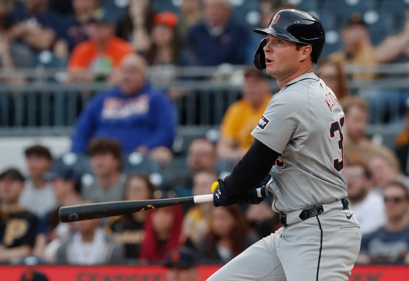 Apr 8, 2024; Pittsburgh, Pennsylvania, USA;  Detroit Tigers second baseman Colt Keith (33) hits an RBI single against the Pittsburgh Pirates during the first inning at PNC Park. Mandatory Credit: Charles LeClaire-USA TODAY Sports