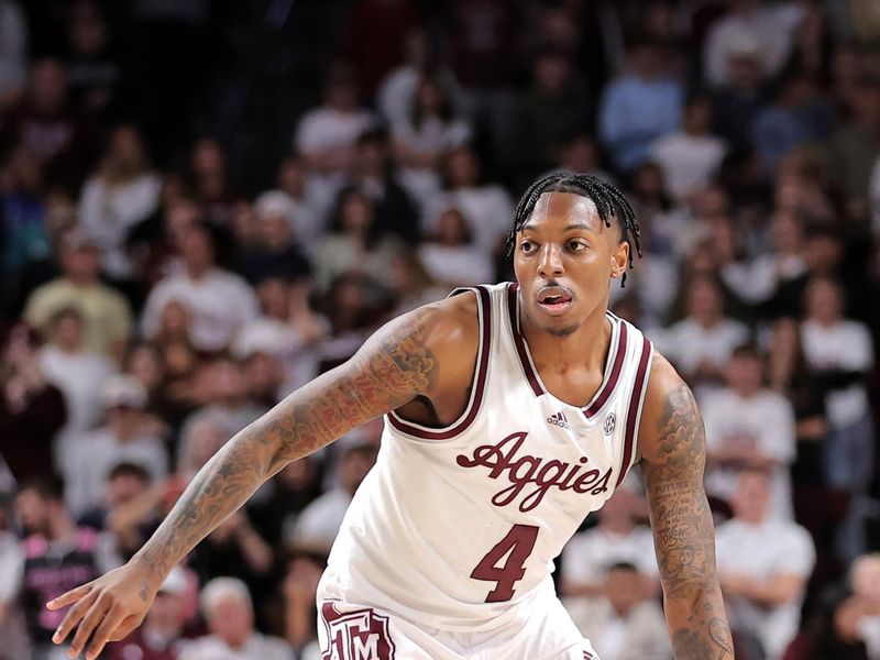 Dec 6, 2023; College Station, Texas, USA; Texas A&M Aggies guard Wade Taylor IV (4) handles the ball against the DePaul Blue Demons during the first half at Reed Arena. Mandatory Credit: Erik Williams-USA TODAY Sports