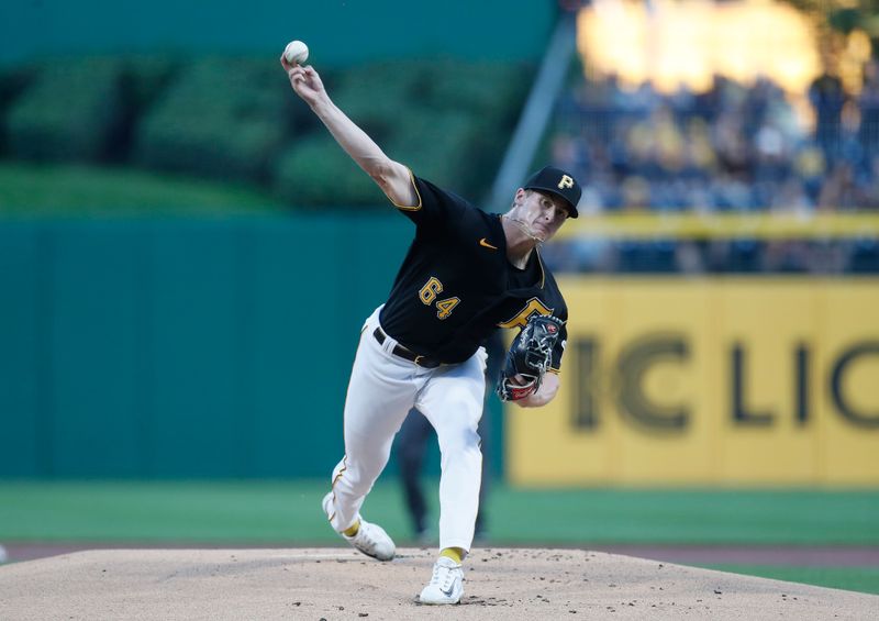 Sep 30, 2023; Pittsburgh, Pennsylvania, USA; Pittsburgh Pirates starting pitcher Quinn Priester (64) delivers a pitch against the Miami Marlins during the first inning at PNC Park. Mandatory Credit: Charles LeClaire-USA TODAY Sports