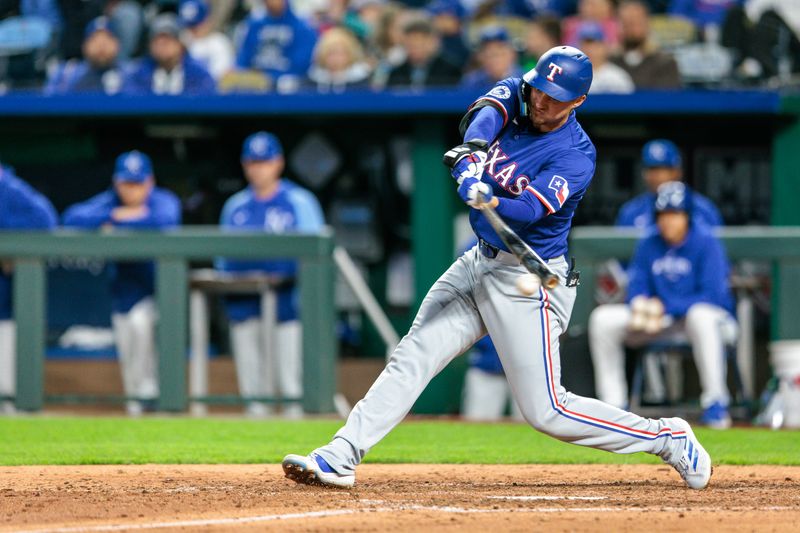 May 4, 2024; Kansas City, Missouri, USA; Texas Rangers shortstop Corey Seager (5) at bat during the eighth inning against the Kansas City Royals at Kauffman Stadium. Mandatory Credit: William Purnell-USA TODAY Sports