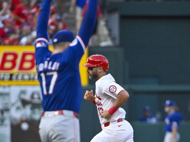 Jul 29, 2024; St. Louis, Missouri, USA;  St. Louis Cardinals designated hitter Matt Carpenter (13) runs the bases after hitting a two run home run off of Texas Rangers starting pitcher Nathan Eovaldi (17) during the third inning at Busch Stadium. Mandatory Credit: Jeff Curry-USA TODAY Sports