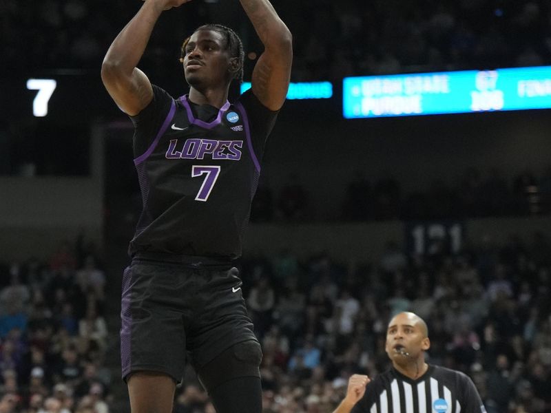 Mar 24, 2024; Spokane, WA, USA; Grand Canyon Antelopes guard Tyon Grant-Foster (7) shoots the ball in the first half against the Alabama Crimson Tide at Spokane Veterans Memorial Arena. Mandatory Credit: Kirby Lee-USA TODAY Sports