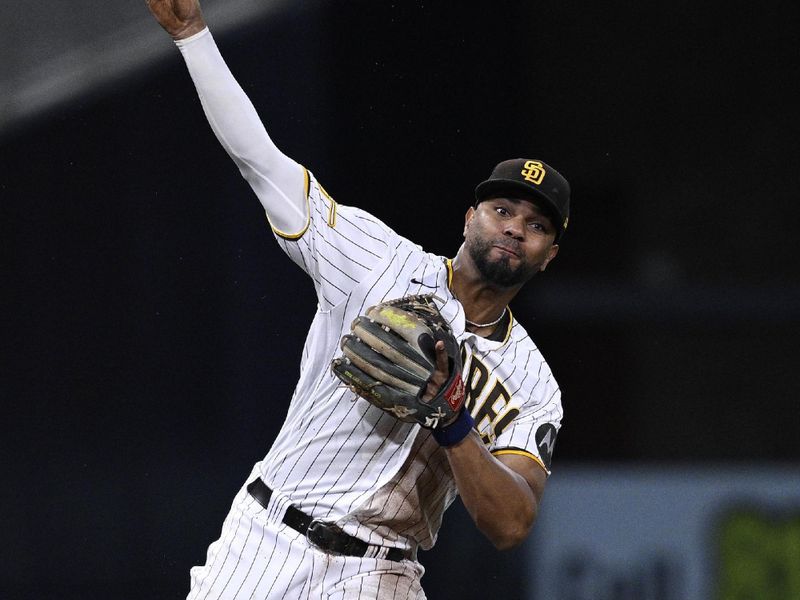 Aug 22, 2023; San Diego, California, USA; San Diego Padres shortstop Xander Bogaerts (2) throws to first base on a ground out by Miami Marlins right fielder Jorge Soler (not pictured) during the seventh inning at Petco Park. Mandatory Credit: Orlando Ramirez-USA TODAY Sports