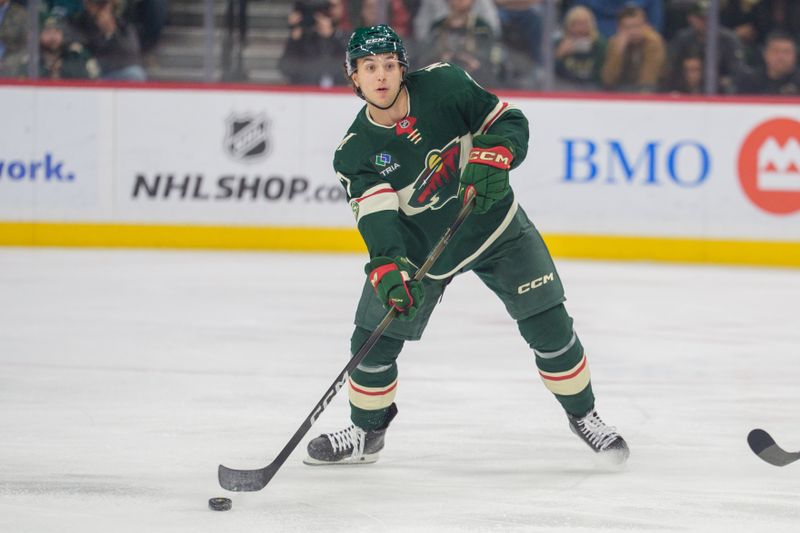 Nov 11, 2025; Saint Paul, Minnesota, USA; Minnesota Wild defenseman Brock Faber (7) passes the puck in the first period against the San Jose Sharks at Grand Casino Arena. Mandatory Credit: Matt Blewett-Imagn Images