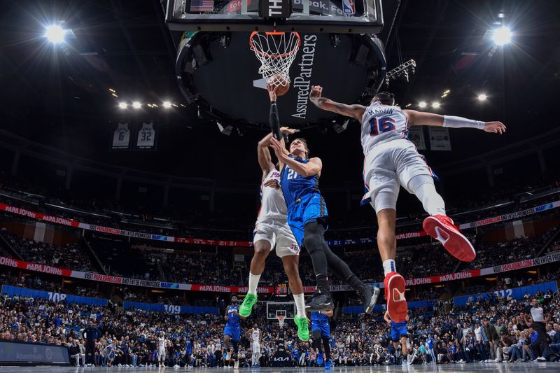 ORLANDO, FL - NOVEMBER 15: Moritz Wagner #21 of the Orlando Magic shoots the ball during the game against the Philadelphia 76ers during the Emirates NBA Cup game on  November 15, 2024 at Kia Center in Orlando, Florida. NOTE TO USER: User expressly acknowledges and agrees that, by downloading and or using this photograph, User is consenting to the terms and conditions of the Getty Images License Agreement. Mandatory Copyright Notice: Copyright 2024 NBAE (Photo by Fernando Medina/NBAE via Getty Images)