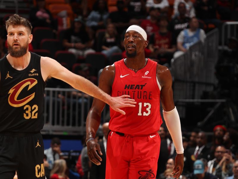 MIAMI, FL - DECEMBER 8: Bam Adebayo #13 of the Miami Heat looks on during the game against the Cleveland Cavaliers on December 8, 2024 at Kaseya Center in Miami, Florida. NOTE TO USER: User expressly acknowledges and agrees that, by downloading and or using this Photograph, user is consenting to the terms and conditions of the Getty Images License Agreement. Mandatory Copyright Notice: Copyright 2024 NBAE (Photo by Issac Baldizon/NBAE via Getty Images)