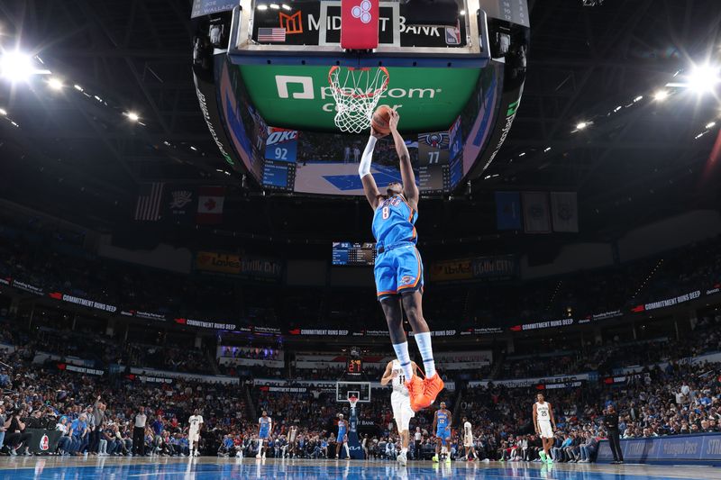 OKLAHOMA CITY, OK - NOVEMBER 13: Jalen Williams #8 of the Oklahoma City Thunder dunks the ball during the game against the New Orleans Pelicans on November 13, 2024 at Paycom Center in Oklahoma City, Oklahoma. NOTE TO USER: User expressly acknowledges and agrees that, by downloading and or using this photograph, User is consenting to the terms and conditions of the Getty Images License Agreement. Mandatory Copyright Notice: Copyright 2024 NBAE (Photo by Nathaniel S. Butler/NBAE via Getty Images)