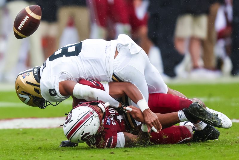 Nov 11, 2023; Columbia, South Carolina, USA; Vanderbilt Commodores cornerback Tyson Russell (8) knocks a pass away from South Carolina Gamecocks wide receiver Ahmarean Brown (10) in the second quarter at Williams-Brice Stadium. Mandatory Credit: Jeff Blake-USA TODAY Sports