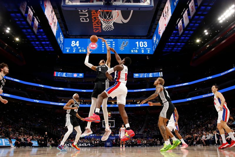 DETROIT, MI - JANUARY 10:  Victor Wembanyama #1 of the San Antonio Spurs grabs a rebound during the game against the Detroit Pistons on January 10, 2024 at Little Caesars Arena in Detroit, Michigan. NOTE TO USER: User expressly acknowledges and agrees that, by downloading and/or using this photograph, User is consenting to the terms and conditions of the Getty Images License Agreement. Mandatory Copyright Notice: Copyright 2024 NBAE (Photo by Brian Sevald/NBAE via Getty Images)