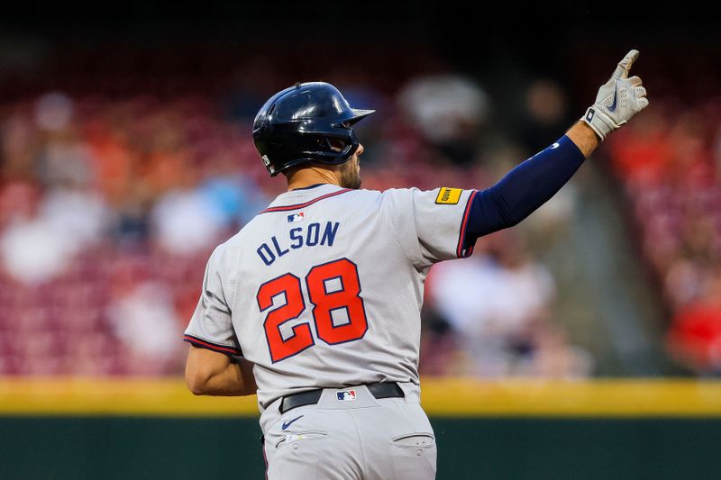 Sep 17, 2024; Cincinnati, Ohio, USA; Atlanta Braves first baseman Matt Olson (28) reacts after hitting a two-run home run in the first inning against the Cincinnati Reds at Great American Ball Park. Mandatory Credit: Katie Stratman-Imagn Images