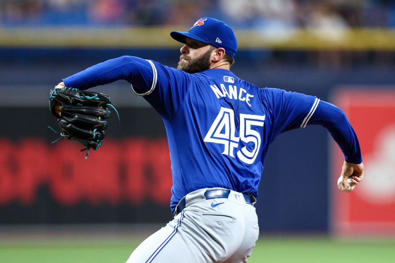 Sep 21, 2024; St. Petersburg, Florida, USA; Toronto Blue Jays pitcher Tommy Nance (45) throws a pitch against the Tampa Bay Rays in the sixth inning at Tropicana Field. Mandatory Credit: Nathan Ray Seebeck-Imagn Images