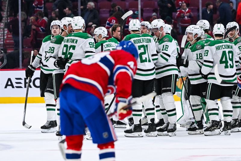 Nov 13, 2025; Montreal, Quebec, CAN; Dallas Stars players gather together to celebrate their win against the Montreal Canadiens after the third period at Bell Centre. Mandatory Credit: David Kirouac-Imagn Images