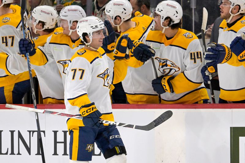 Mar 10, 2024; Saint Paul, Minnesota, USA;  Nashville Predators forward Luke Evangelista (77) celebrates his goal against the Minnesota Wild during the second period at Xcel Energy Center. Mandatory Credit: Nick Wosika-USA TODAY Sports

