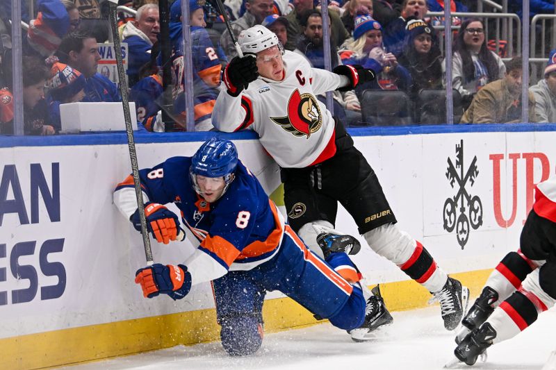 Jan 14, 2025; Elmont, New York, USA;  Ottawa Senators left wing Brady Tkachuk (7) checks New York Islanders defenseman Noah Dobson (8) into the boards during the first period at UBS Arena. Mandatory Credit: Dennis Schneidler-Imagn Images