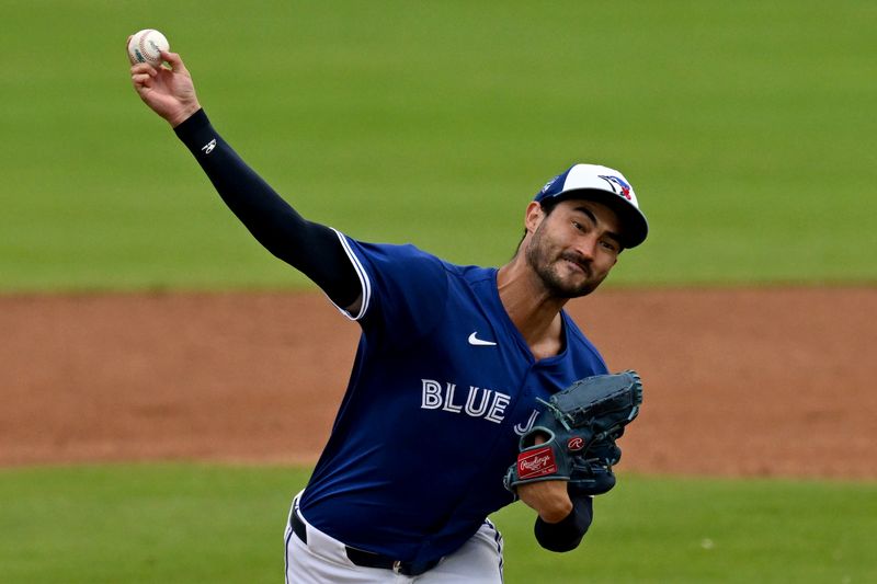 Mar 22, 2024; Dunedin, Florida, USA; Toronto Blue Jays starting pitcher Mitch White (45) throws a pitch in the third inning of the spring training game against the Boston Red Sox at TD Ballpark. Mandatory Credit: Jonathan Dyer-USA TODAY Sports