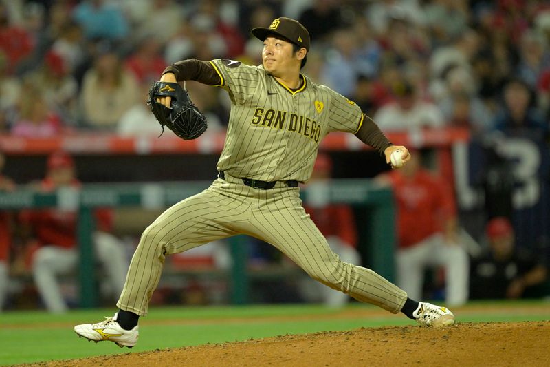 Jun 4, 2024; Anaheim, California, USA;  San Diego Padres relief pitcher Yuki Matsui (1) delivers to the plate in the seventh inning against the Los Angeles Angels at Angel Stadium. Mandatory Credit: Jayne Kamin-Oncea-USA TODAY Sports