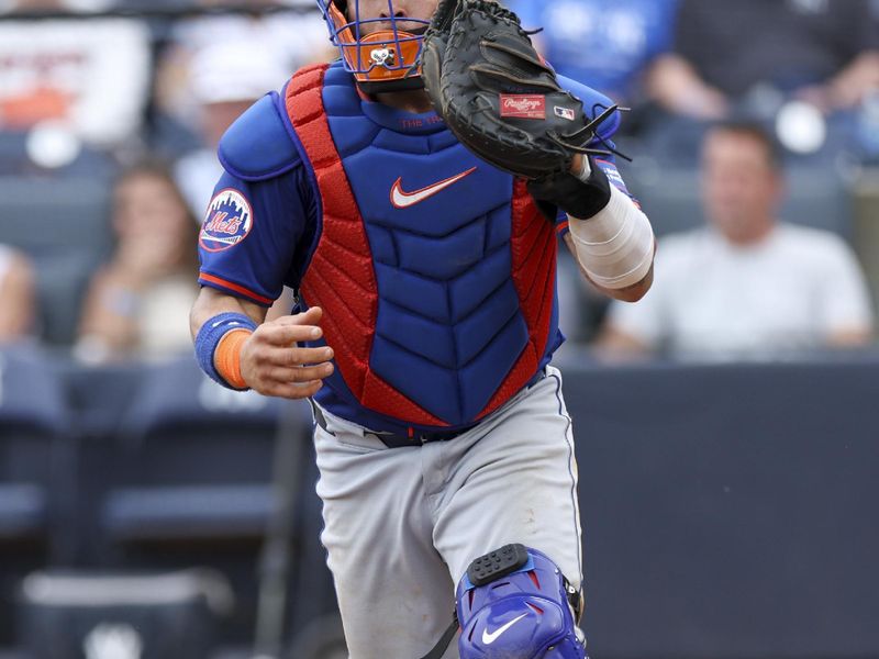 Mar 22, 2024; Tampa, Florida, USA;  New York Mets catcher Francisco Alvarez (4) catches New York Yankees center fielder Trent Grisham (12) (not pictured) in a run down in the sixth inning at George M. Steinbrenner Field. Mandatory Credit: Nathan Ray Seebeck-USA TODAY Sports