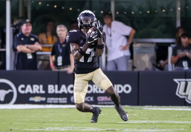 Oct 9, 2021; Orlando, Florida, USA; UCF Knights defensive back Trevion Shadrick-Harris (17) catches a punt during the second quarter against the East Carolina Pirates at Bounce House. Mandatory Credit: Mike Watters-USA TODAY Sports