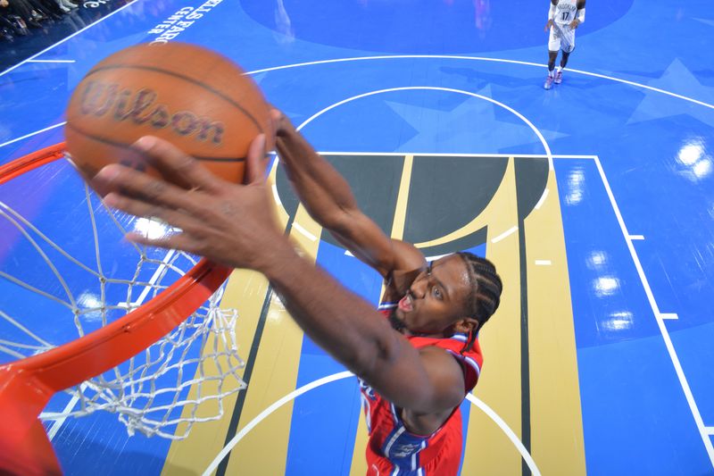 PHILADELPHIA, PA - NOVEMBER 22: Tyrese Maxey #0 of the Philadelphia 76ers dunks the ball during the game against the Brooklyn Nets during the Emirates NBA Cup game on November 22, 2024 at the Wells Fargo Center in Philadelphia, Pennsylvania NOTE TO USER: User expressly acknowledges and agrees that, by downloading and/or using this Photograph, user is consenting to the terms and conditions of the Getty Images License Agreement. Mandatory Copyright Notice: Copyright 2024 NBAE (Photo by Jesse D. Garrabrant/NBAE via Getty Images)