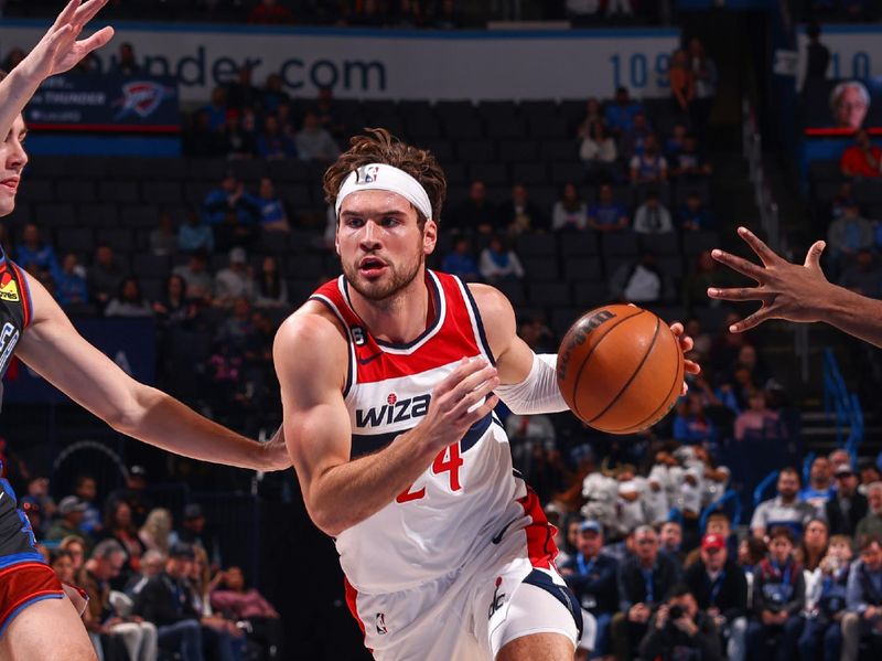 OKLAHOMA CITY, OK - JANUARY 6:  Corey Kispert #24 of the Washington Wizards drives to the basket during the game against the Oklahoma City Thunder on January 6, 2023 at Paycom Arena in Oklahoma City, Oklahoma. NOTE TO USER: User expressly acknowledges and agrees that, by downloading and or using this photograph, User is consenting to the terms and conditions of the Getty Images License Agreement. Mandatory Copyright Notice: Copyright 2023 NBAE (Photo by Zach Beeker/NBAE via Getty Images)