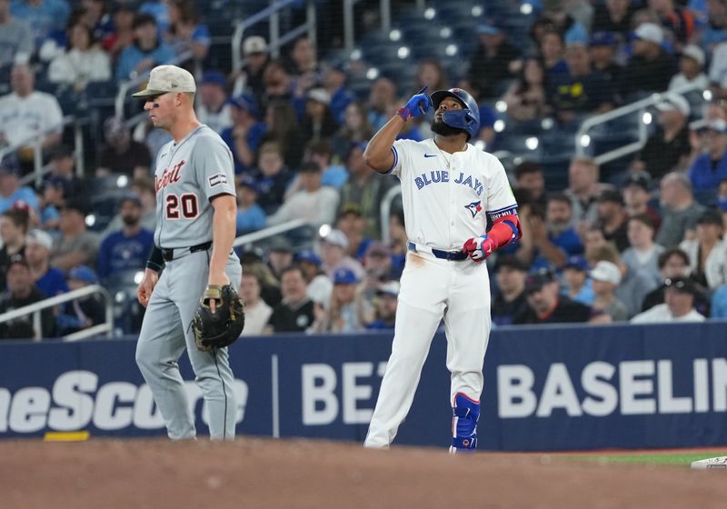 May 18, 2025; Toronto, Ontario, CAN; Toronto Blue Jays first baseman Vladimir Guerrero Jr. (27) celebrates hitting a single against the Detroit Tigers during the first inning at Rogers Centre. Mandatory Credit: Nick Turchiaro-Imagn Images