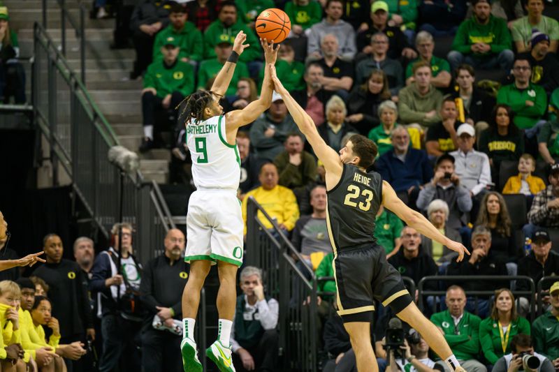 Jan 18, 2025; Eugene, Oregon, USA; Oregon Ducks guard Keeshawn Barthelemy (9) shoots the ball against Purdue Boilermakers forward Camden Heide (23) during the second half at Matthew Knight Arena. Mandatory Credit: Craig Strobeck-Imagn Images