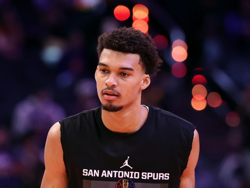 PHOENIX, ARIZONA - DECEMBER 03: Victor Wembanyama #1 of the San Antonio Spurs warms up before the Emirates NBA Cup game against the Phoenix Suns at Footprint Center on December 03, 2024 in Phoenix, Arizona. NOTE TO USER: User expressly acknowledges and agrees that, by downloading and or using this photograph, User is consenting to the terms and conditions of the Getty Images License Agreement.  (Photo by Chris Coduto/Getty Images)