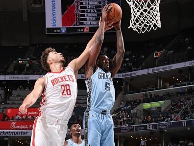 MEMPHIS, TN - DECEMBER 15:  Vince Williams Jr. #5 of the Memphis Grizzlies rebounds the ball during the game against the Houston Rockets on December 15, 2023 at FedExForum in Memphis, Tennessee. NOTE TO USER: User expressly acknowledges and agrees that, by downloading and or using this photograph, User is consenting to the terms and conditions of the Getty Images License Agreement. Mandatory Copyright Notice: Copyright 2023 NBAE (Photo by Joe Murphy/NBAE via Getty Images)