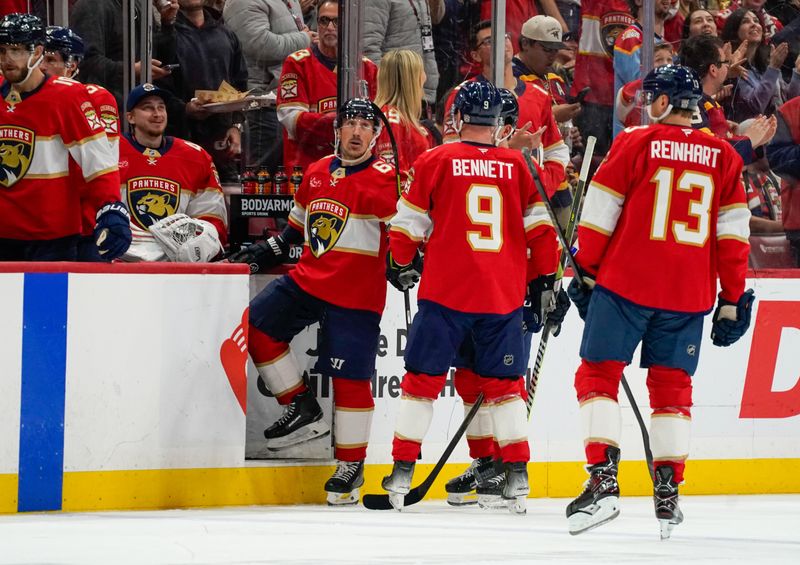 Dec 27, 2025; Sunrise, Florida, USA; Florida Panthers left wing Brad Marchand (63) celebrates a goal against the Tampa Bay Lightning during the second period at Amerant Bank Arena. Mandatory Credit: Jeff Romance-Imagn Images