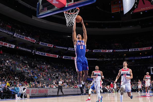 PHILADELPHIA, PA - DECEMBER 11: Jaden Springer #11 of the Philadelphia 76ers drives to the basket during the game against the Washington Wizards on December 11, 2023 at the Wells Fargo Center in Philadelphia, Pennsylvania NOTE TO USER: User expressly acknowledges and agrees that, by downloading and/or using this Photograph, user is consenting to the terms and conditions of the Getty Images License Agreement. Mandatory Copyright Notice: Copyright 2023 NBAE (Photo by Jesse D. Garrabrant/NBAE via Getty Images)