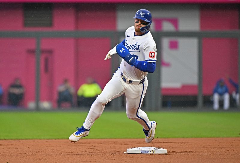 May 7, 2025; Kansas City, Missouri, USA;  Kansas City Royals shortstop Bobby Witt Jr. (7) rounds second base after a base hit from Kansas City Royals designated hitter Vinnie Pasquantino (not pictured) in the first inning against the Chicago White Sox at Kauffman Stadium. Mandatory Credit: Peter Aiken-Imagn Images