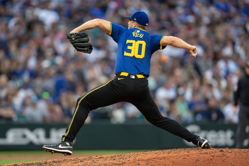 Jun 28, 2024; Seattle, Washington, USA; Seattle Mariners reliever Austin Voth (30) delivers a pitch during the sixth inning against the Minnesota Twins at T-Mobile Park. Mandatory Credit: Stephen Brashear-USA TODAY Sports