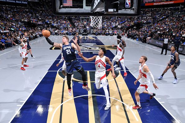 ORLANDO, FL - NOVEMBER 21: Moritz Wagner #21 of the Orlando Magic grabs the rebound during the game against the Toronto Raptors during the In-Season Tournament on November 21, 2023 at Amway Center in Orlando, Florida. NOTE TO USER: User expressly acknowledges and agrees that, by downloading and or using this photograph, User is consenting to the terms and conditions of the Getty Images License Agreement. Mandatory Copyright Notice: Copyright 2023 NBAE (Photo by Fernando Medina/NBAE via Getty Images)