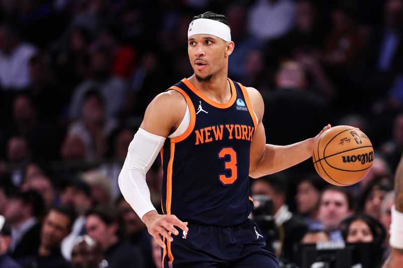 NEW YORK, NEW YORK - MARCH 12: Josh Hart #3 of the New York Knicks brings the ball up court during the fourth quarter against the Philadelphia 76ers at Madison Square Garden on March 12, 2024 in New York City. NOTE TO USER: User expressly acknowledges and agrees that, by downloading and or using this photograph, User is consenting to the terms and conditions of the Getty Images License Agreement. (Photo by Dustin Satloff/Getty Images)