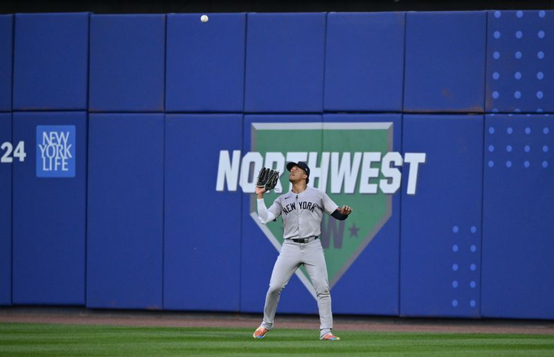 Aug 18, 2024; Williamsport, Pennsylvania, USA; New York Yankees outfielder Juan Soto (22) fields a fly ball against the Detroit Tigers in the third inning at BB&T Ballpark at Historic Bowman Field. Mandatory Credit: Kyle Ross-USA TODAY Sports