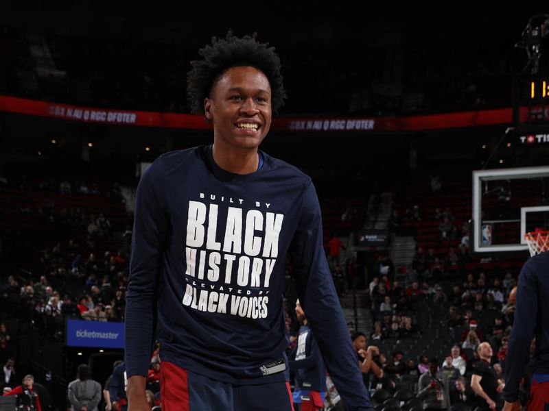 PORTLAND, OR - FEBRUARY 23: Peyton Watson #8 of the Denver Nuggets smiles before the game against the Portland Trail Blazers on February 23, 2024 at the Moda Center Arena in Portland, Oregon. NOTE TO USER: User expressly acknowledges and agrees that, by downloading and or using this photograph, user is consenting to the terms and conditions of the Getty Images License Agreement. Mandatory Copyright Notice: Copyright 2024 NBAE (Photo by Cameron Browne/NBAE via Getty Images)