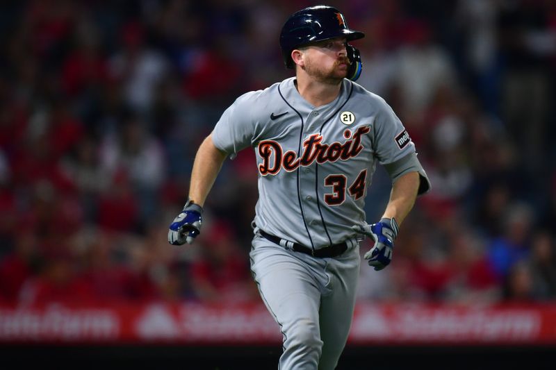 Sep 15, 2023; Anaheim, California, USA; Detroit Tigers catcher Jake Rogers (34) runs after hitting a solo home run against the Los Angeles Angels during the sixth inning at Angel Stadium. Mandatory Credit: Gary A. Vasquez-USA TODAY Sports