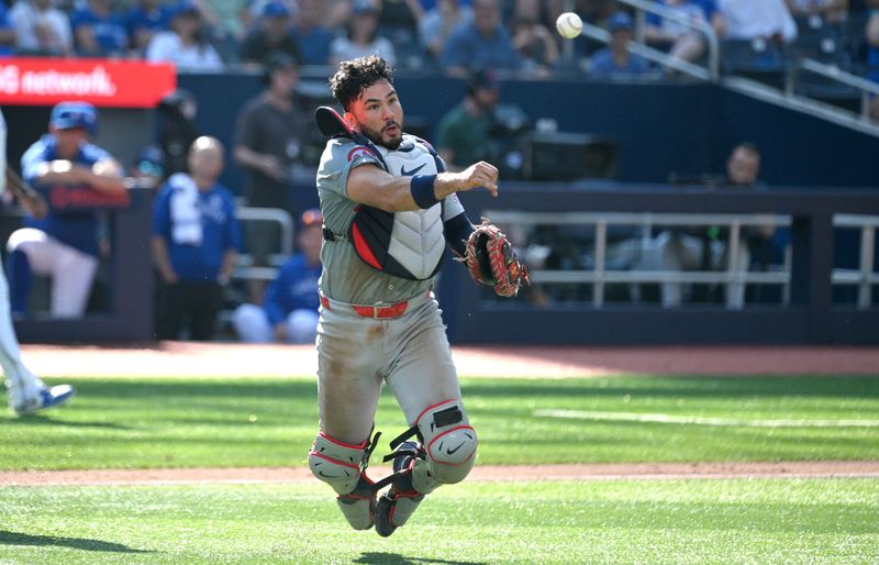 Sep 15, 2024; Toronto, Ontario, CAN;  St. Louis Cardinals catcher Ivan Herrera (48) throws to first to force out Toronto Blue Jays shortstop Ernie Clement (not pictured) in the eighth inning at Rogers Centre. Mandatory Credit: Dan Hamilton-Imagn Images