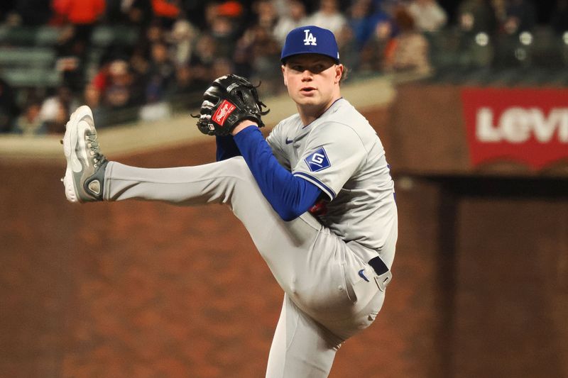 May 14, 2024; San Francisco, California, USA; Los Angeles Dodgers relief pitcher Gus Varland (58) pitches against the San Francisco Giants during the eighth inning at Oracle Park. Mandatory Credit: Kelley L Cox-USA TODAY Sports