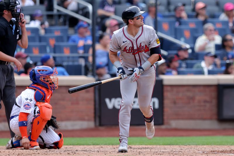 Jul 28, 2024; New York City, New York, USA; Atlanta Braves third baseman Austin Riley (27) watches his two run home run against the New York Mets during the seventh inning at Citi Field. Mandatory Credit: Brad Penner-USA TODAY Sports