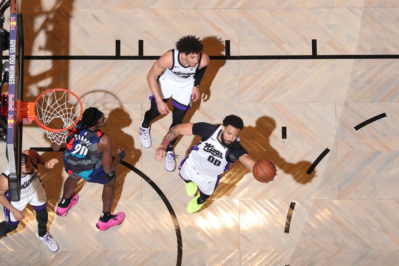 BROOKLYN, NY - APRIL 7: JaVale McGee #00 of the Sacramento Kings grabs a rebound during the game against the Brooklyn Nets on April 7, 2024 at Barclays Center in Brooklyn, New York. NOTE TO USER: User expressly acknowledges and agrees that, by downloading and or using this Photograph, user is consenting to the terms and conditions of the Getty Images License Agreement. Mandatory Copyright Notice: Copyright 2024 NBAE (Photo by Nathaniel S. Butler/NBAE via Getty Images)