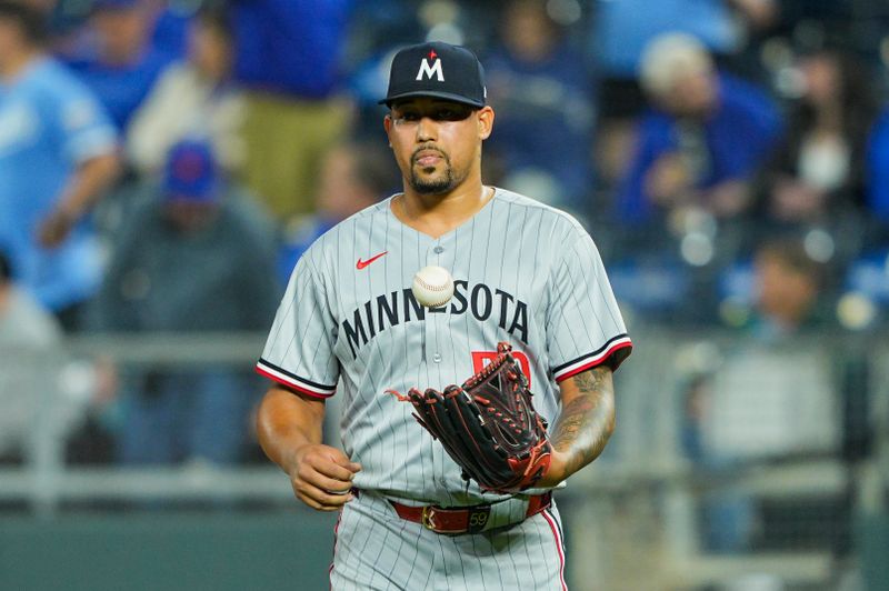 Apr 9, 2025; Kansas City, Missouri, USA; Minnesota Twins relief pitcher Jhoan Duran (59) reacts after defeating the Kansas City Royals Kauffman Stadium. Mandatory Credit: Jay Biggerstaff-Imagn Images