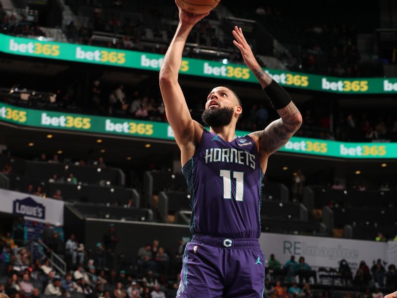 CHARLOTTE, NC - FEBRUARY 14:  Cody Martin #11 of the Charlotte Hornets shoots the ball during the game against the Atlanta Hawks on February 14, 2024 at Spectrum Center in Charlotte, North Carolina. NOTE TO USER: User expressly acknowledges and agrees that, by downloading and or using this photograph, User is consenting to the terms and conditions of the Getty Images License Agreement. Mandatory Copyright Notice: Copyright 2024 NBAE (Photo by Kent Smith/NBAE via Getty Images)