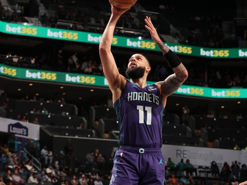 CHARLOTTE, NC - FEBRUARY 14:  Cody Martin #11 of the Charlotte Hornets shoots the ball during the game against the Atlanta Hawks on February 14, 2024 at Spectrum Center in Charlotte, North Carolina. NOTE TO USER: User expressly acknowledges and agrees that, by downloading and or using this photograph, User is consenting to the terms and conditions of the Getty Images License Agreement. Mandatory Copyright Notice: Copyright 2024 NBAE (Photo by Kent Smith/NBAE via Getty Images)