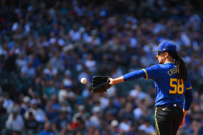 Aug 11, 2024; Seattle, Washington, USA; Seattle Mariners starting pitcher Luis Castillo (58) catches a thrown ball during the first inning against the New York Mets at T-Mobile Park. Mandatory Credit: Steven Bisig-USA TODAY Sports