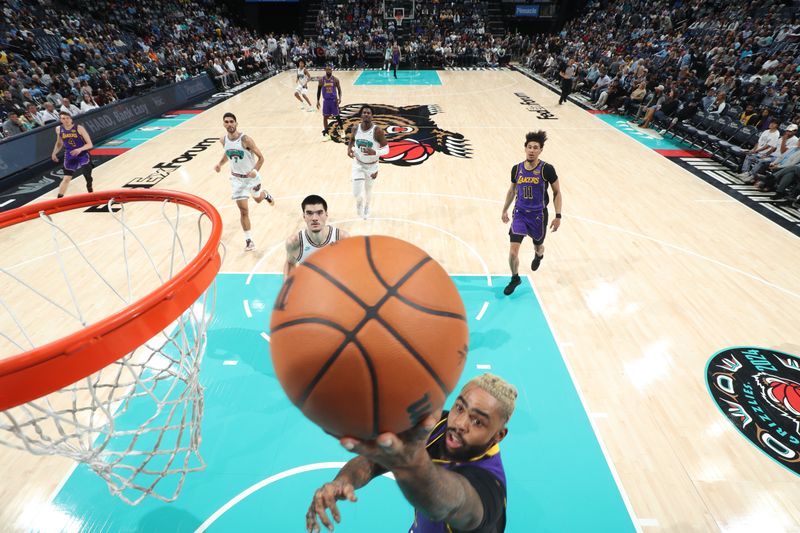 MEMPHIS, TN - NOVEMBER 6: D'Angelo Russell #1 of the Los Angeles Lakers drives to the basket during the game against the Memphis Grizzlies on November 6, 2024 at FedExForum in Memphis, Tennessee. NOTE TO USER: User expressly acknowledges and agrees that, by downloading and or using this photograph, User is consenting to the terms and conditions of the Getty Images License Agreement. Mandatory Copyright Notice: Copyright 2024 NBAE (Photo by Joe Murphy/NBAE via Getty Images)