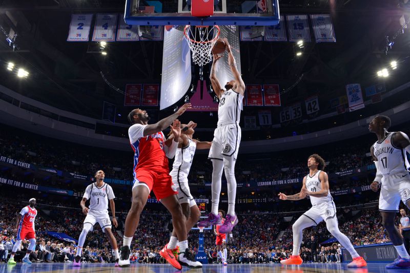 PHILADELPHIA, PA - NOVEMBER 22: Nicolas Claxton #33 of the Brooklyn Nets dunks the ball during the game against the Philadelphia 76ers during the Emirates NBA Cup game on November 22, 2024 at the Wells Fargo Center in Philadelphia, Pennsylvania NOTE TO USER: User expressly acknowledges and agrees that, by downloading and/or using this Photograph, user is consenting to the terms and conditions of the Getty Images License Agreement. Mandatory Copyright Notice: Copyright 2024 NBAE (Photo by Jesse D. Garrabrant/NBAE via Getty Images)