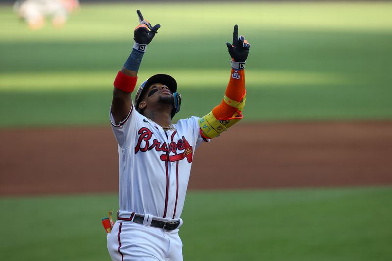 Jun 27, 2023; Atlanta, Georgia, USA; Atlanta Braves right fielder Ronald Acuna Jr. (13) reacts after a home run against the Minnesota Twins in the first inning at Truist Park. Mandatory Credit: Brett Davis-USA TODAY Sports
