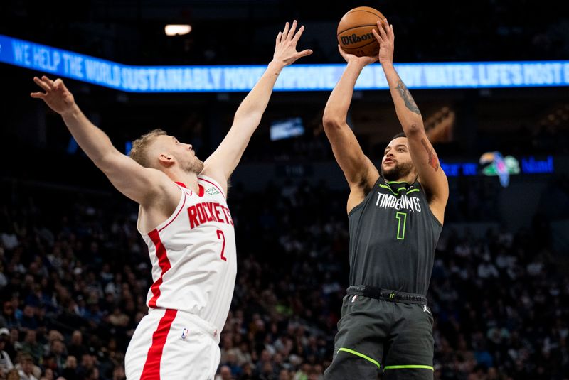 MINNEAPOLIS, MINNESOTA - APRIL 2: Kyle Anderson #1 of the Minnesota Timberwolves shoots the ball over defender Jock Landale #2 of the Houston Rockets in the fourth quarter of the game at Target Center on April 2, 2024 in Minneapolis, Minnesota. NOTE TO USER: User expressly acknowledges and agrees that, by downloading and or using this photograph, User is consenting to the terms and conditions of the Getty Images License Agreement. (Photo by Stephen Maturen/Getty Images)